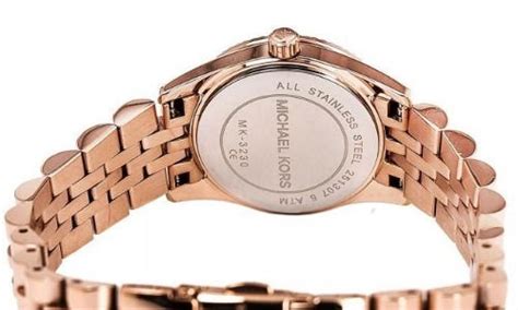 como identificar un reloj michael kors original